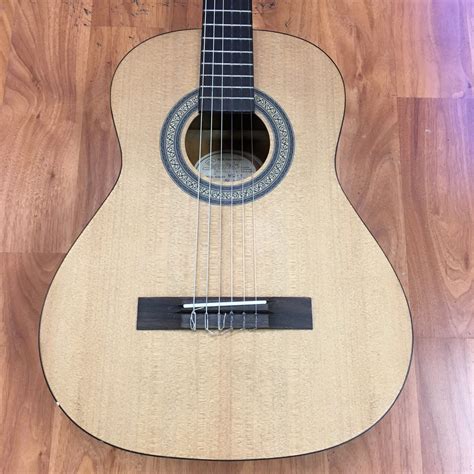 short scale classical guitar.